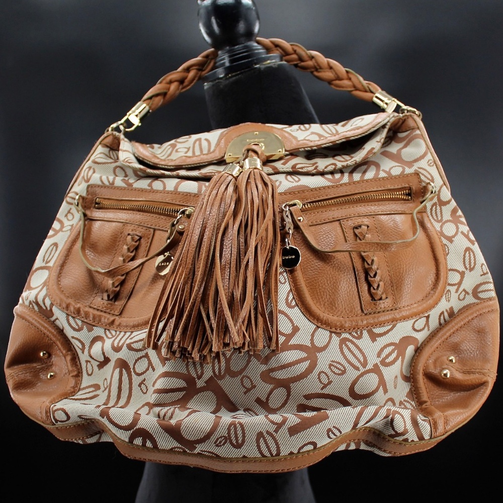 bebe Logo Two Tone Tan/Cream Tasseled Flop Over Single Handle Satchel Purse
